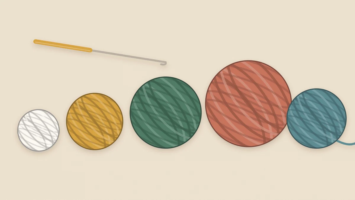 Five balls of yarn in different thicknesses and warm colors with a crochet hook beside them