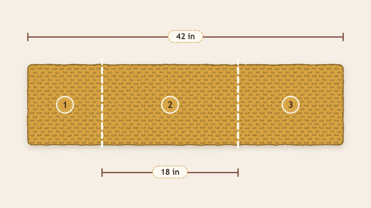 One long crochet rectangle marked with two fold lines showing how the ends overlap to form an envelope back